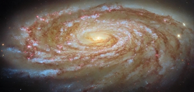 Το Hubble καταγράφει έναν εκπληκτικό σπειροειδή γαλαξία που σιγά σιγά χάνει το μέλλον του (scitechdaily.com)